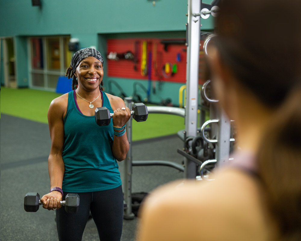 A member exercising in a Carilion Wellness facility